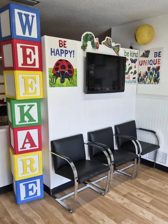 The front lobby, with WEE KARE spelled out in letter blocks beside the seating